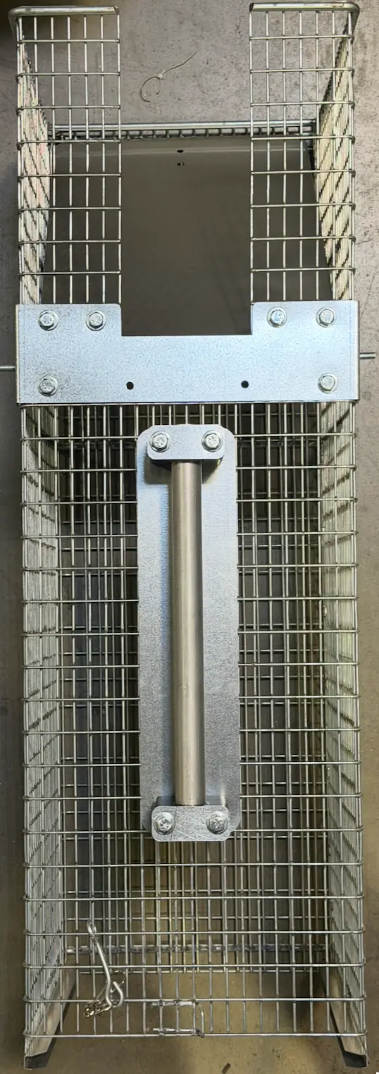 Top view of the trap with the handle guard and tube in place
